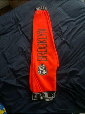 Women’s fluorescent orange basketball Sweatpants
